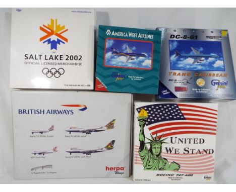 Herpa and Gemini Jets - five boxed diecast airplanes 1:400 and 1:500 scale comprising N915AW, N911US, N8786R, 70128 and 51219