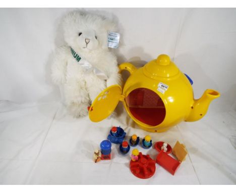 Bluebird - a child's Big Yellow Teapot by Bluebird containing a car, a roundabout, figures, teacups and a bed, unboxed, in ne