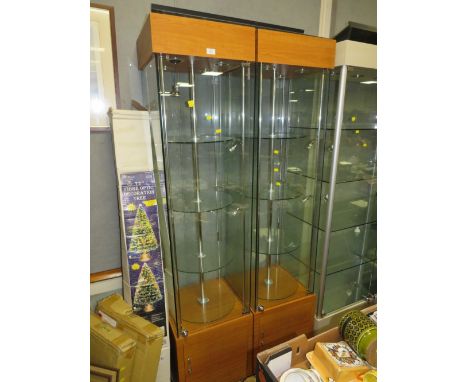 A PAIR OF MODERN SQUARE LIGHT-UP REVOLVING DISPLAY CABINETS WITH KEYS