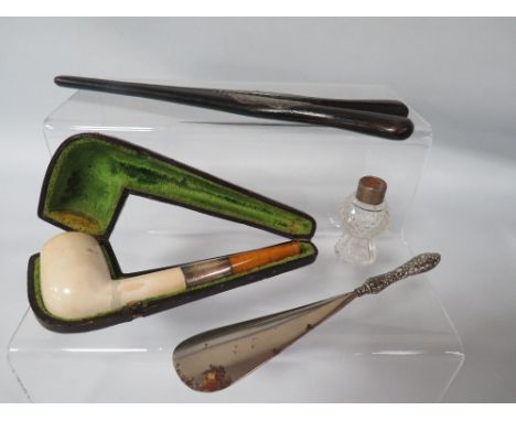 A SILVER MOUNTED MEERSCHAUM &amp; AMBER PIPE, GLOVE STRETCHERS, SHOE HORN ETC