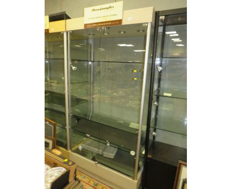 A MODERN TWO DOOR LIGHT-UP DISPLAY CABINET WITH KEYS 198 X 100 CM