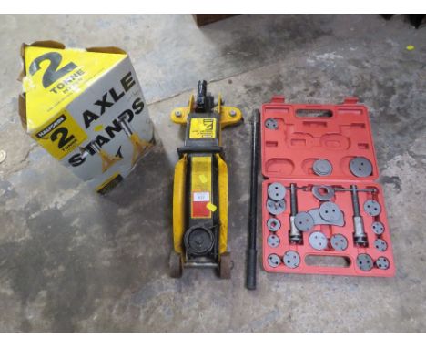 A HALFORDS CAR JACK AND BOXES , AXLE STANDS WITH BRAKE CALIPER RETRACTION TOOL