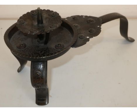 Japanese bronze candle stand with raised sconce, on three mounted supports (approx height 17cm) 
