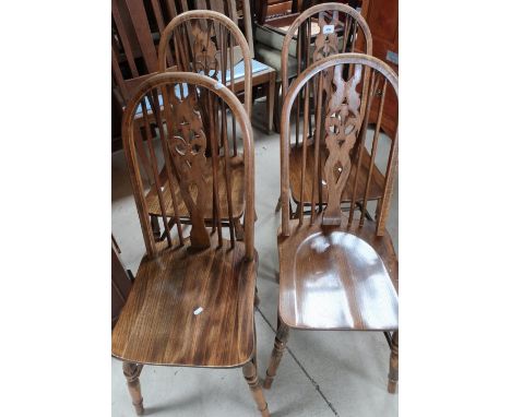 Set of four stick back chairs with thistle detail to central panel 