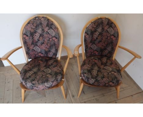 Pair of Ercol light elm stick back armchairs with loose cushions 