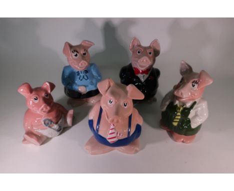 Set of five Wade Natwest piggy banks 