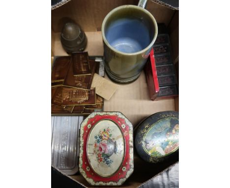 Selection of various tins including World Star Cigarettes with domino set, inert shell head, Wade musical tankard and selecti