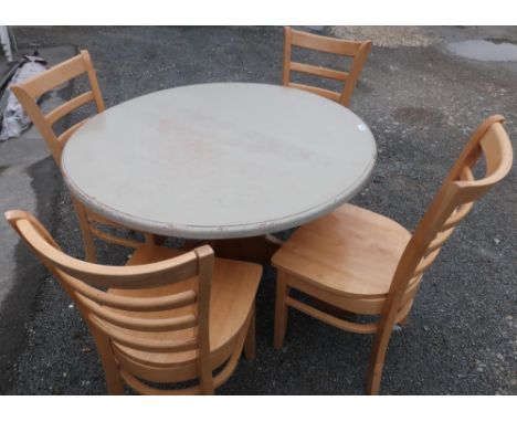 Pine circular table with painted top and a set of four ladder back beech chairs 