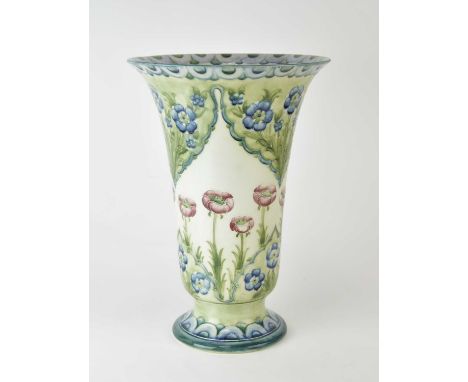 A large and impressive William Moorcroft Macintyre &amp; Co 'Poppy and Forget-me-Not', circa 1908-09, of footed trumpet form,