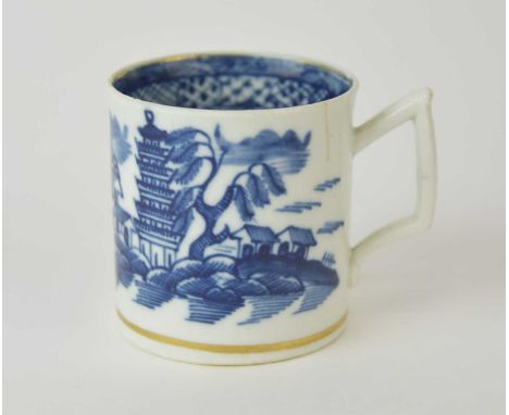 A Caughley 'Tower' coffee can, circa 1790, painted in underglaze blue with an associated interior border, the cup an uncommon