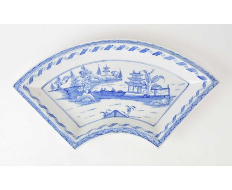 A very rare Caughley 'Contemplation' pattern fan-shaped quadrant dish, circa 1796-1799, painted in a lighter underglaze blue 