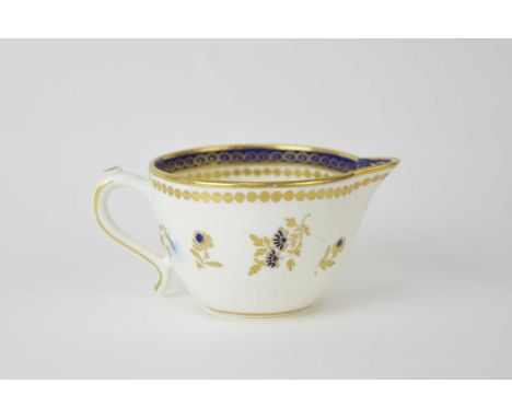 A Caughley 'Dresden Flowers' milk jug, circa 1788-93, of unusual plain form versus the slightly more common reeded examples, 