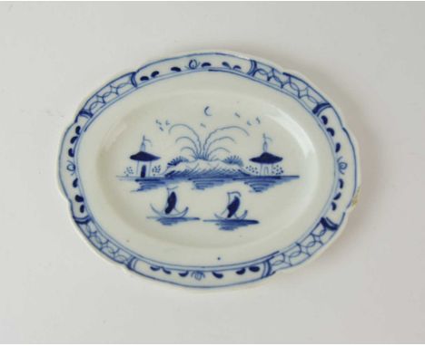 A Caughley toy 'Island' oval dinner platter, circa 1785-88, painted in bright blue with the Island pattern with associated se