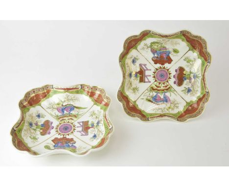 A pair of Caughley 'Dragons in Compartment' square dessert dishes, painted in over-glaze enamels and gilt, of canted form, un