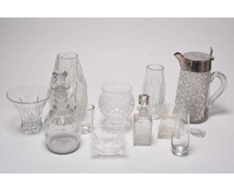A collection of clear glass, comprising a small rectangular glass bottle and stopper etched with flowers and foliage, 17.5cm 