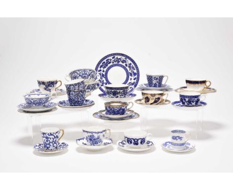 A collection of Coalport teawares, late 19th and early 20th centuries, decorated in blue, white and gilt, comprising a teacup