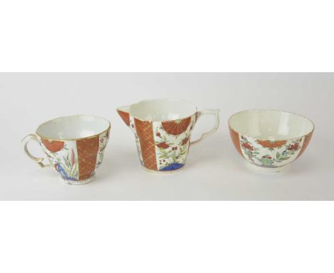 A small group of Worcester in the 'Scarlet Gold and Japan' pattern, circa 1770-80, comprising an ogee chocolate or breakfast 