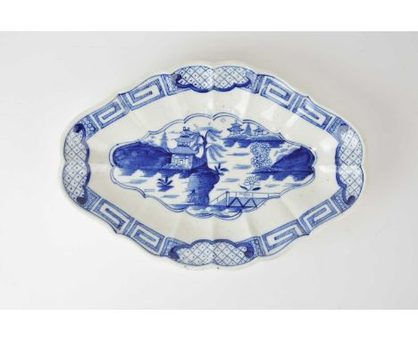 A Caughley dessert dish in the 'Weir' pattern, circa 1785-93, of melon form with a cusped rim, painted in underglaze blue wit