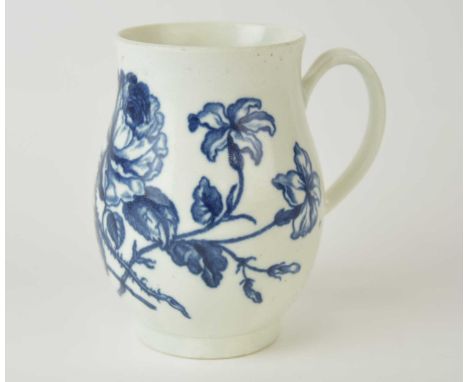 A rare Caughley 'Thorny Rose' bell-shaped mug, circa 1776-1780, transfer-printed in underglaze blue, the unglazed base marked