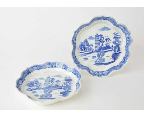 A pair of Caughley 'Tower' pattern hexagonal teapot stands, circa 1783-95, painted in underglaze blue, unmarked, 16cm wide ov