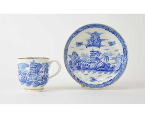 A Caughley 'Tower' coffee cup and saucer, circa 1790, painted in underglaze blue with an associated border and gilt-lined rim