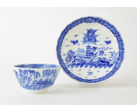 A Caughley spiral reeded and 'shanked' tea bowl and saucer, painted in underglaze blue the Tower pattern, circa 1790-96, unma