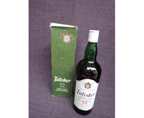 A bottle of 1970's Talisker 12 year old Single Malt Scotch Whisky, 43% GL, 1 Litre, in card box