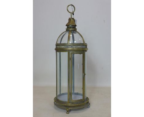 A large contemporary gilt metal storm lantern, with domed top, H.82cm 