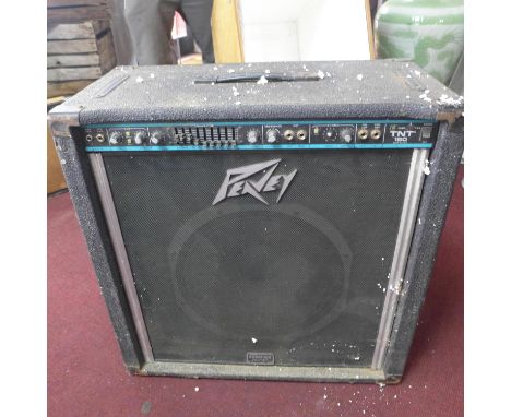 A cased Peavey amplifier, H: 71 x W: 73 x D: 40cm 