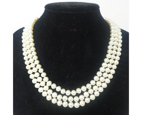 A 9ct yellow gold clasped, 3-strand cultured pearl necklace, (cream-coloured pearls) L: 45cm, pearl: 6 x 5mm each approx 