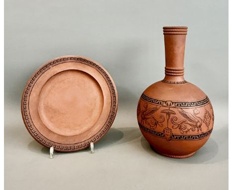 A late-19th century Watcombe Pottery terracotta bottle vase and plate in the classical taste - the vase impressed '2 714' and