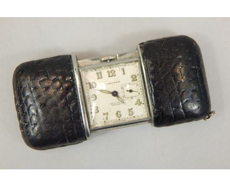 A Movado Ermeto pressed leather wrapped purse watch, 70mm extended, having square dial, with second subsidiary dial to 3 o'cl