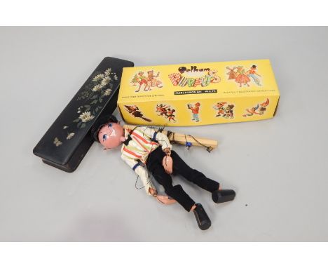 A Pelham puppet, Jazz Man, in original box and a Victorian papier mache glove box (2)