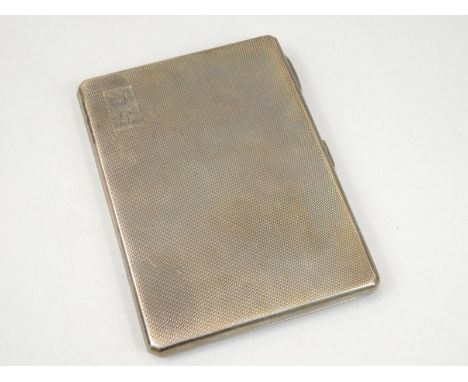 An Edward VII engine turned silver cigarette case, engraved to the interior Coronation 1937 from the Mayor of East Retford Co