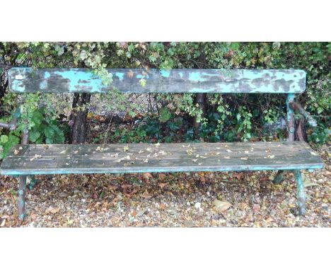 A Victorian rustic style cast iron garden bench, with slatted back and seat, 107cm wide.