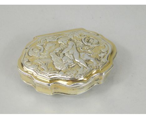 An 18thC silver gilt Continental gilt white metal snuff box, decorated with Hercules and a lion etc., marks indistinct, 8cm w