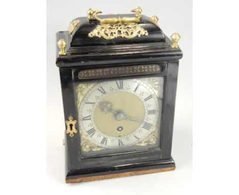 An ebonised bracket timepiece, the brass dial with silver chapter ring, the engraved movement stamped John Wise, London, on o