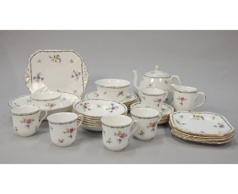 A Shelley part tea service, decorated with flower sprays, printed mark in green to underside and printed mark to Lowestoft, 1