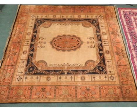 An early to mid 20thC Axminster type machine woven carpet, decorated in Neo-classical style. 