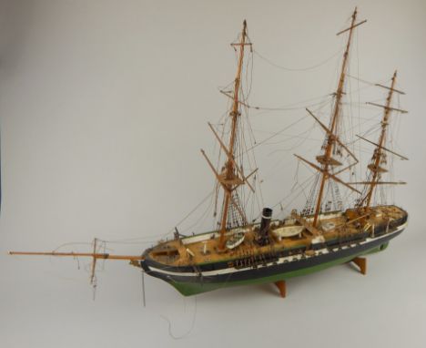 A scale model of three masted steam vessel, with green and black painted hull, 103cm long. Provenance: Butterfields, Thoresby