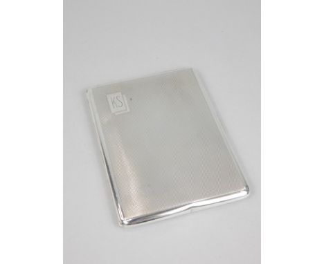 An Art Deco period engine turned silver cigarette case, bearing the initials KS, Birmingham 1920, 4¾oz