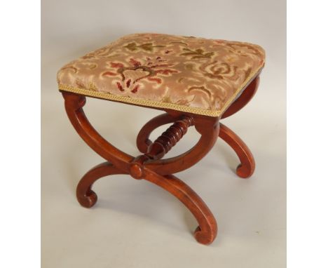 A  Victorian mahogany stool, with a padded seat on x shaped supports, with turned stretcher, 40cm wide.