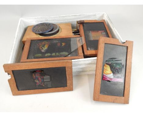 Various Victorian magic lantern slides, to include some automaton type examples with brass handles, etc, one stamped Newton o