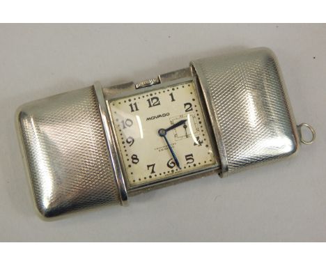 A Movado Ermeto chronometer stainless steel purse watch, of rectangular form, total width extended 70mm, having square dial w
