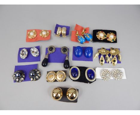 A quantity of clip on fashion earrings, to include stone set enamel work and others. (1 bag)