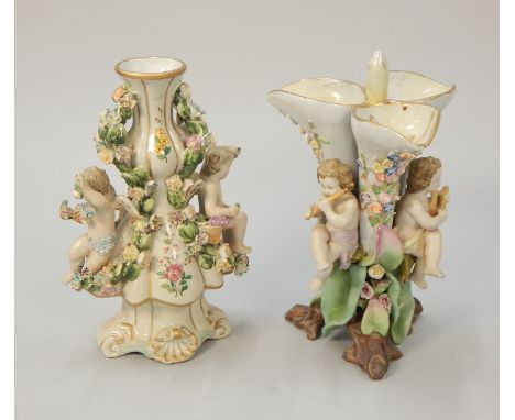 Two 20thC Continental porcelain pieces, one a triple vase applied with putti playing musical instruments and another similar 