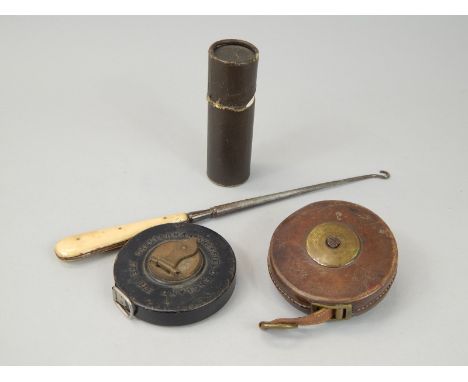 Miscellaneous items, to include two tape measures, a button hook and a Bakelite spy glass, in travelling case, the Zonex seag