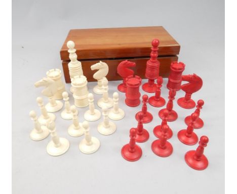 An oriental turned bone part chess set, part stained red