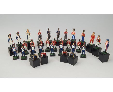 A military based chess set, containing a number of hand painted metal figures, mainly depicting soldiers of the Napoleonic Wa