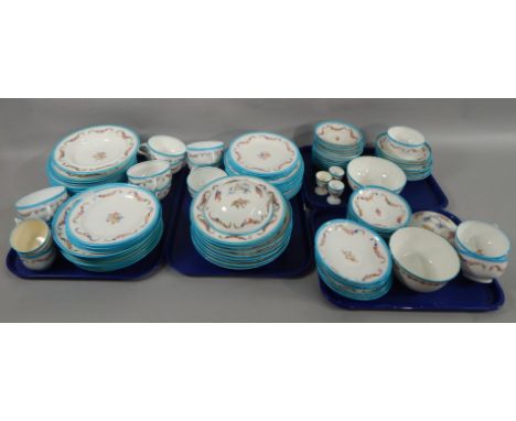 An extensive Mintons Victorian part dinner and tea service, printed and painted with flower swags, within a turquoise border,